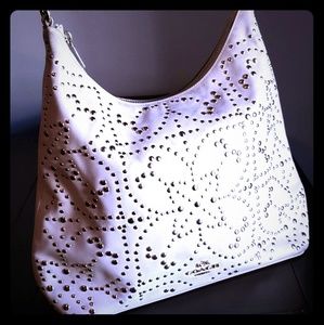 white gold studded coach bag